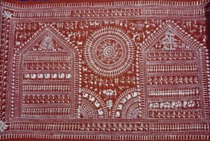 A traditional Warli painting with tribal motifs and geometric patterns